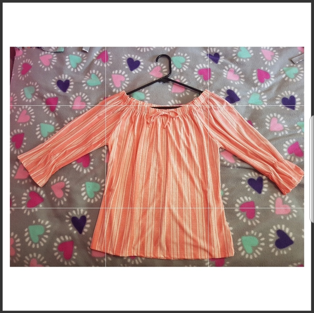 Pink shirt with white stripes